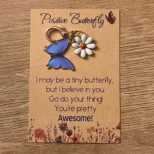 Blue Butterfly and Daisy Charm